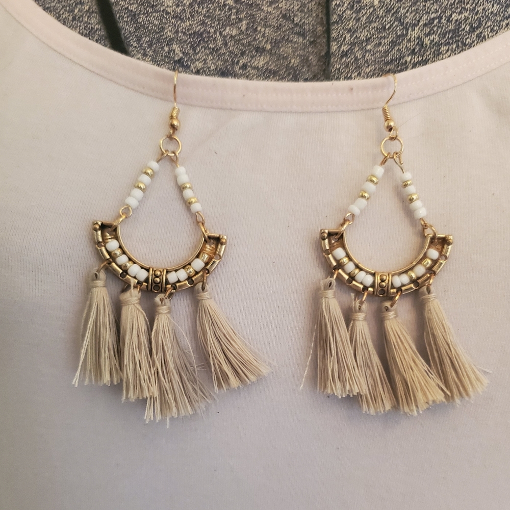 Gold and white tassel earrings